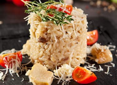 Risotto con pesce spada e pomodori ciliegini