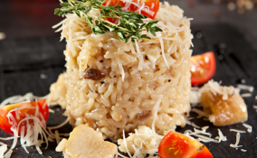 Risotto con pesce spada e pomodori ciliegini